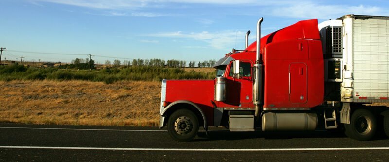 Transportation Insurance - Red Truck on road